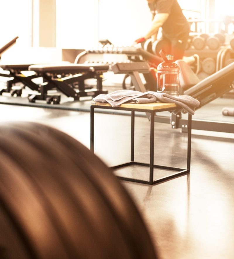 The abstract blur fitness gym background at sunny day